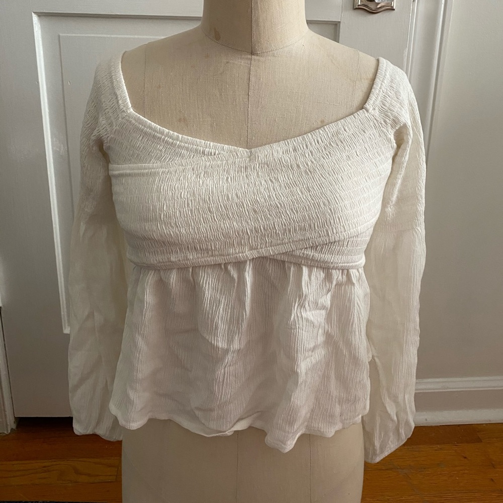 White flowy top